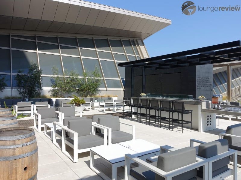 The outdoor deck with fire pits is one the standout features of the Star Alliance Lounge LAX.