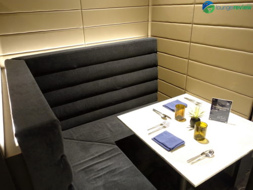 Highly private individual booth at the expanded United Polaris Lounge Chicago O'Hare