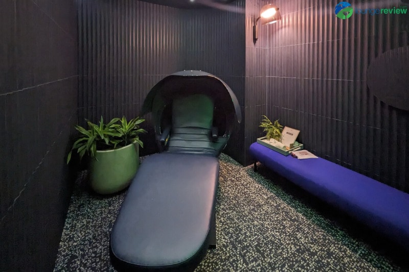 Relaxation room with energy pod at the Capital One Lounge Denver